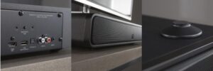 Dettagli di una soundbar con connessioni e speaker.
