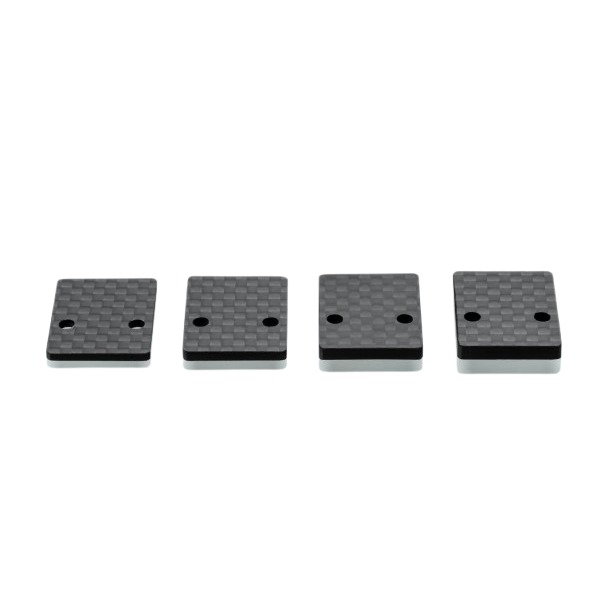 Quattro spessori in carbonio per headshell disposti in fila
