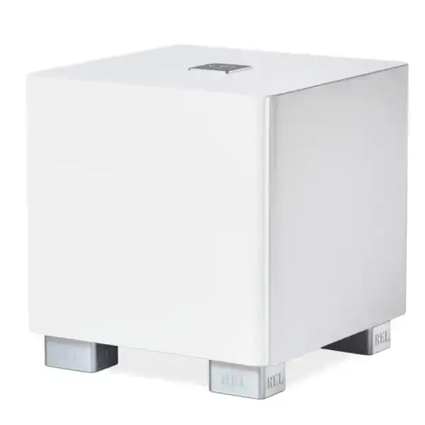 Subwoofer attivo REL Acoustics T/5x con finitura bianca e piedi in plastica trasparente